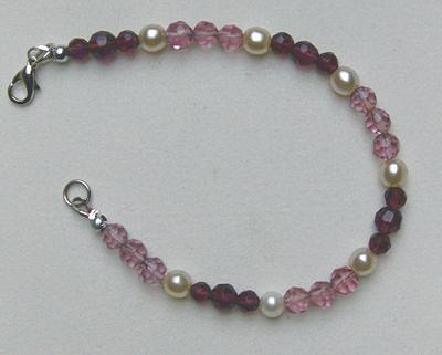 Bild 2 Armband, Kristallperlen in violetttönen und Perlen