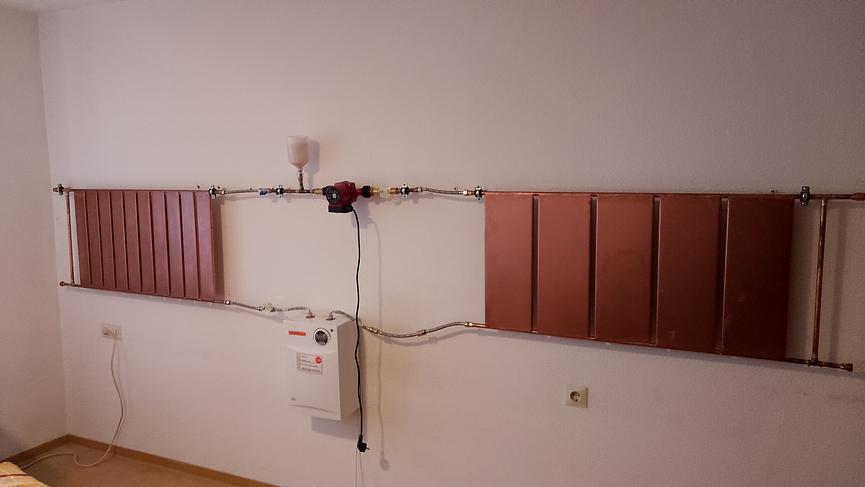 Bild 7 HEIZKÖRPER AUS KUPFER. HEIZKOSTEN UM CA. 50 % REDUZIERT 