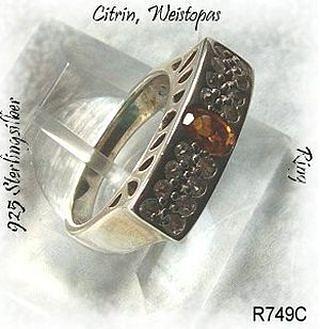 Bild 1 Ring, 925 Silber mit gefassten Weistopasen und einen Citrin