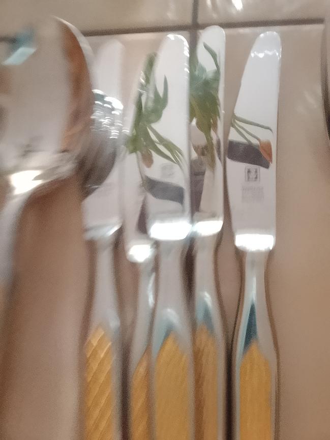 Bild 4 Vergoldetes Besteck  40 Euro