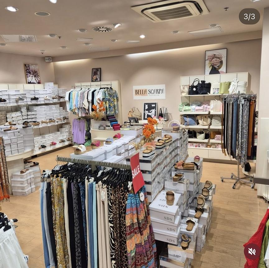 Bild 1 Verkäufer im beliebten italienischen Schuhgeschäft