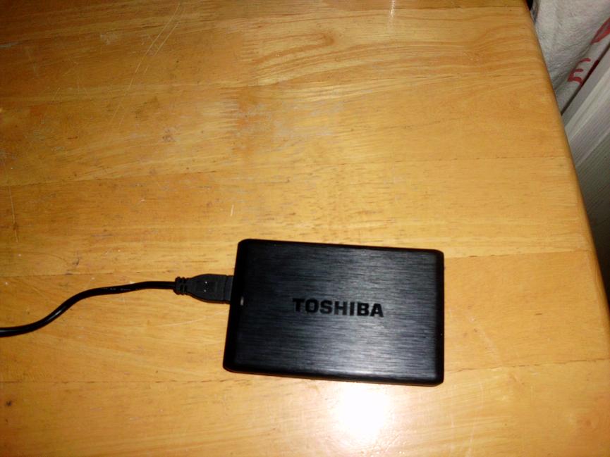Bild 1 gebe  eine 1TB externne festplatte von toshiba günstig ab nur für 18euro