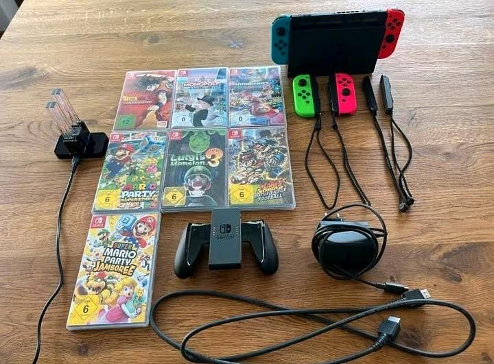 Bild 1 Tausche Nintendo Switch Oled mit 10 Spielen gegen 5 6er Packs Schwipp Schwapp