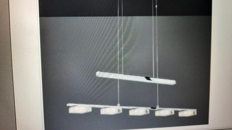 Elegante Chromleuchte für Esstisch