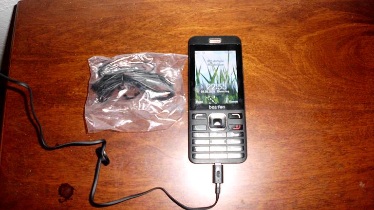 gebe hier ein bea fon tasten duall band handy ab nur für 8euro ab