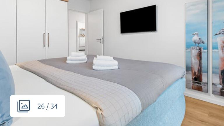 Ostseewohnung mit Strandkorb, Sauna und Kamin